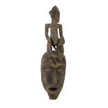 AN AFRICAN BAULE MASK, IVORY COAST 20TH CENTURY Measures cm. 52 x 18 x 13. MASCHERA AFRICANA,