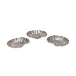 THREE ASHTRAYS IN SILVER, PUNCH MILANO1944/1968 with basin to shell and feet to conchigliette.