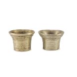 TWO SMALL MORTARS IN BRONZE, END 18TH CENTURY gilded patina, filleted bodies. Measures cm. 8 x 10.