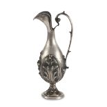 JUG IN SILVER, PUNCH MILAN, 1944/1968 body embossed with leaves. Measures cm. 32 x 10 x 15, weight