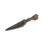 A TIBETAN RITUAL BRONZE AND IRON DAGGER, 20TH CENTURY with vajra hilt decorated by heads of