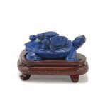 A CHINESE LAPIS LAZULI SCULPTURE, 20TH CENTURY. representing a composition of four turtle.