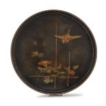 A JAPANESE ROUND TRAY, 20TH CENTURY in black lacquer, polychromy and gold, decorated with flowers