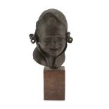 NEAPOLITAN SCULPTOR, 19TH CENTURY BABY'S HEAD WITH BONNET Bronze with burnished patina, cm. 24 x