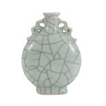 A CHINESE CELADON GLAZED PORCELAIN FLASK. LATE 19TH, EARLY 20TH CENTURY decorated with small handles