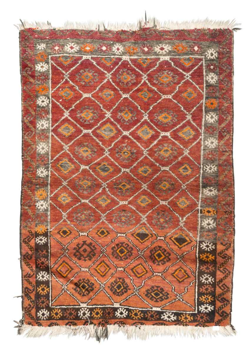 NOMADIC BELUCISTAN CARPET, LATE 19TH CENTURY grid design with small rhombuses, in the center field
