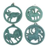 QUATTRO SEGNI ZODIACALI IN CERAMICA, VIETRI XX SECOLO a smalto verde a sagoma circolare. Tre marcati