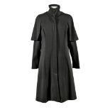 CAPPOTTO VERSACE, FINE ANNI '60 in jersey di lana nero con mantellina. Etichetta Versace. Taglia