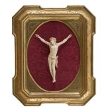 CHRIST IN IVORY, END 18TH CENTURY beautifully sculpted with mobile arms. In giltwood frame with