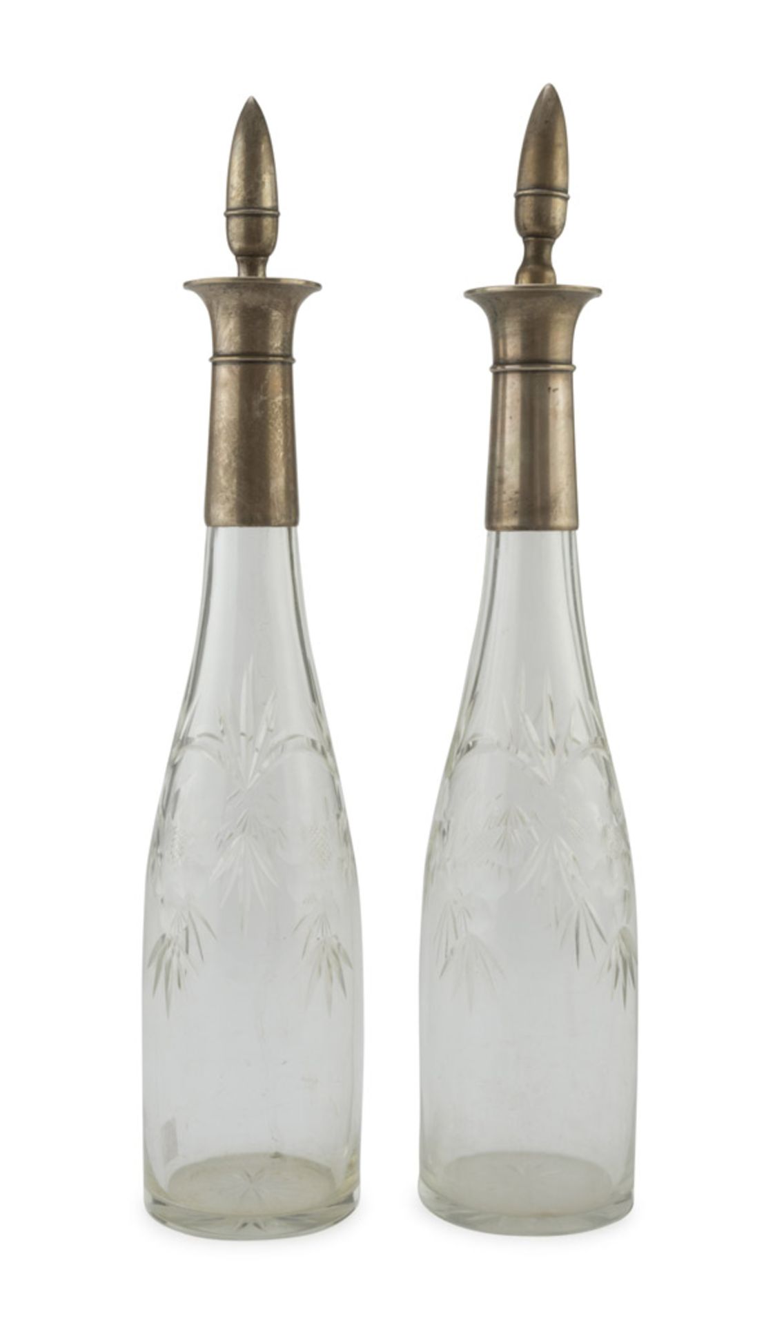 A PAIR OF GLASS BOTTLES, EARLY 20TH CENTURY silver-plated necks and caps engraved with floral