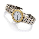 WRIST WATCH CARTIER in steel and gold, with round dial to white ground with Roman numerals.