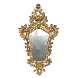 BEAUTIFUL GILTWOOD MIRROR, EMILIA 18TH CENTURY cartouche shaped with rich carvings to curled