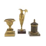 THREE MIGNON OBJECTS IN ORMOLU, FRANCE EMPIRE PERIOD consisting of model of amphora, model of