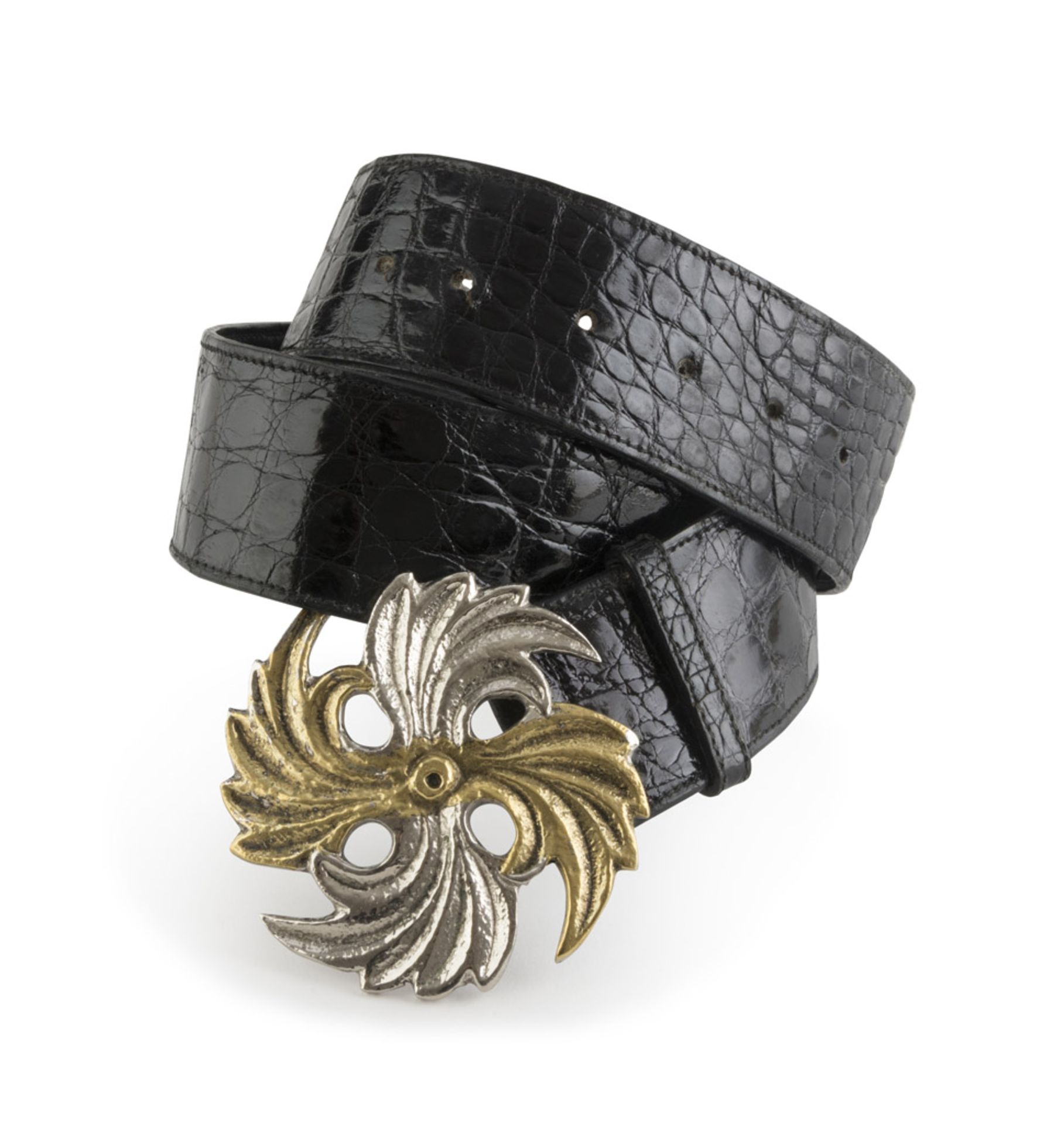 WOMAN'S BELT GIORGIO GUCCI, 1980s in crocodile with buckle in flower-shaped metal. CINTA DA DONNA