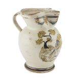 CERAMIC PITCHER, PUGLIA 19TH CENTURY polychrome and cream enamel decorated with landscape and