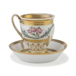 PORCELAIN CUP AND SAUCER, FRANCE 19TH CENTURY decorated with flowers and gold with augural
