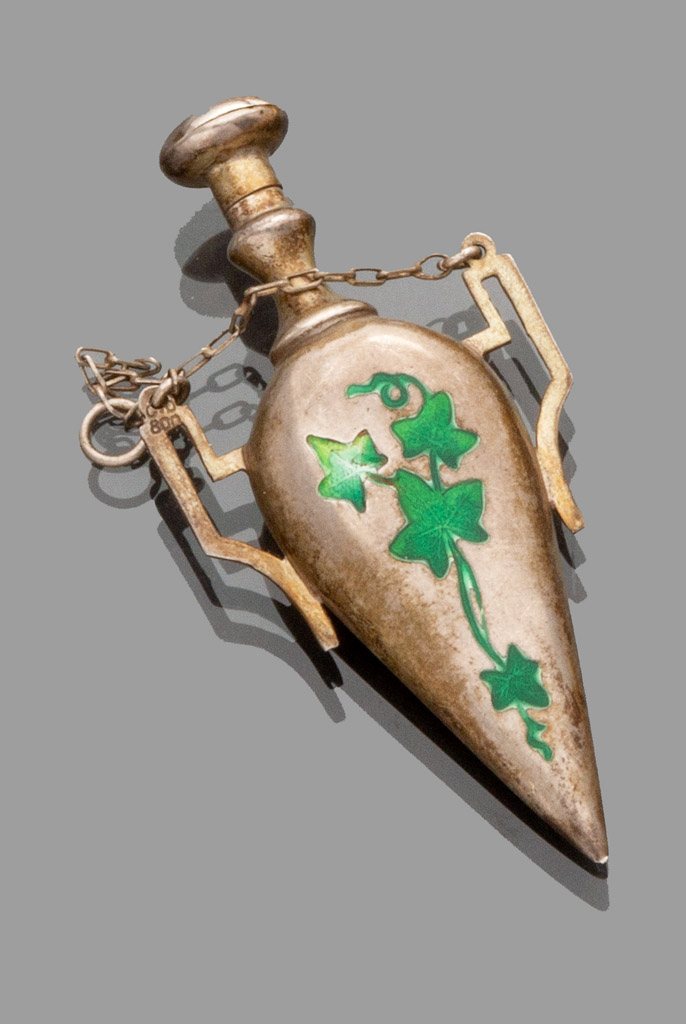 PERFUME BOTTLE PENDANT in gilded silver shaped to small amphora decorated with green enamel.