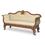 WALNUT COUCH, EARLY 19TH CENTURY back with double scrolls centered by roccaille, dolphin legs.