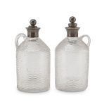 A PAIR OF SMALL BOTTLES IN BLOWN GLASS, UNITED KINGDOM EARLY 20TH CENTURY necks an caps in silver-