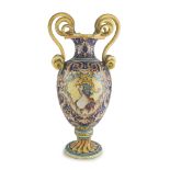 VASE IN MAIOLICA, DERUTA EARLY 20TH CENTURY in polychrome enamels, decorated with grotesque,
