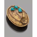 BUCKLE IN BRASS, 1950S oval shape with three turquoise stones and palm bas-relief. Measures cm. 9