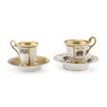 TWO PORCELAIN CUPS, MEISSEN 19TH CENTURY with saucers, decorated with flowers and gold, one gilded