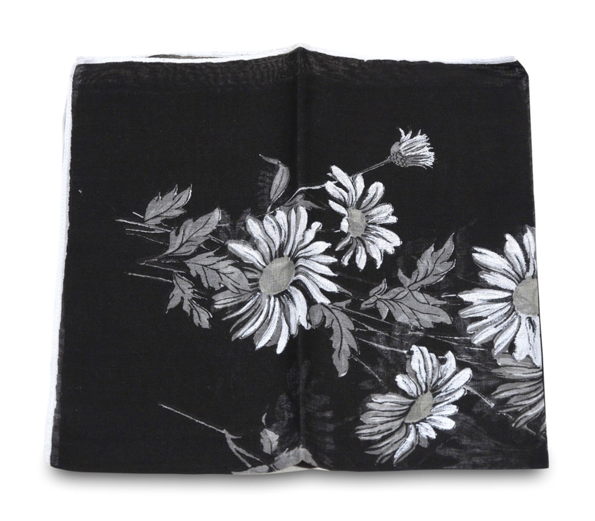 SMALL POCKET HANDKERCHIEF, 1980S in black organdy with printed daisies in grey tones. FAZZOLETTO