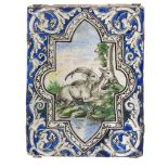 BIG MAIOLICA TILE, 19TH CENTURY in polychrome enamels, decorated by reserve with rams in landscape