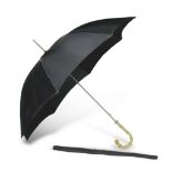 Umbrella, 1950s in black silk with handle in plastics to false bamboo. Complete of sheath. OMBRELLO,