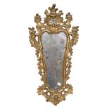 BEAUTIFUL GILTWOOD MIRROR, EMILIA 18TH CENTURY cartouche shaped richly sculpted to floral spiral