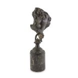 NEAPOLITAN SCULPTOR, 19TH CENTURY WOMAN'S BUST WITH THE HAIR IN THE WIND Bronze with burnished