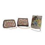 THREE VINTAGE PURSES, 1940S in gross-point fabric and beads, with floral figurations. Hinges in