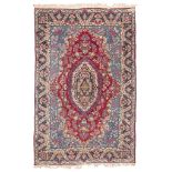 SPLENDID KIRMAN CARPET, EARLY 20TH CENTURY with oval floral medallion and secondary motifs of