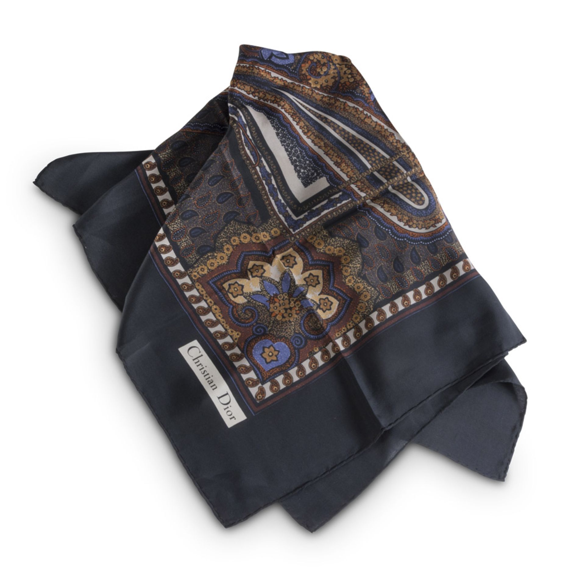 FOULARD CHRISTIAN DIOR in silk, feather on black ground of peacock of Indian style. FOULARD