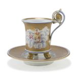 PORCELAIN CUP AND SAUCER, SEVRES 20TH CENTURY of Empire taste, to gilt ground decorated with