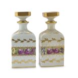 A PAIR OF PORCELAIN FLASKS, 20TH CENTURY in polychromy and gold, with floral decorum. Measures cm.