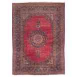 SPLENDID KIRMAN CARPET, EARLY 20TH CENTURY with arabesque medallion of flowers and secondary