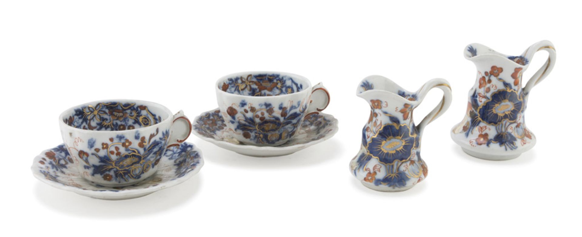 SMALL PORCELAIN SET, FRANCE 19TH CENTURY in cobalt, orange and gold enamel, with floral decorums.