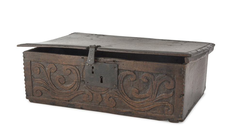 BOX IN OAK, PROBABLY FRANCE 18TH CENTURY with carvings to twisted leaves. Coeval lock. Measures