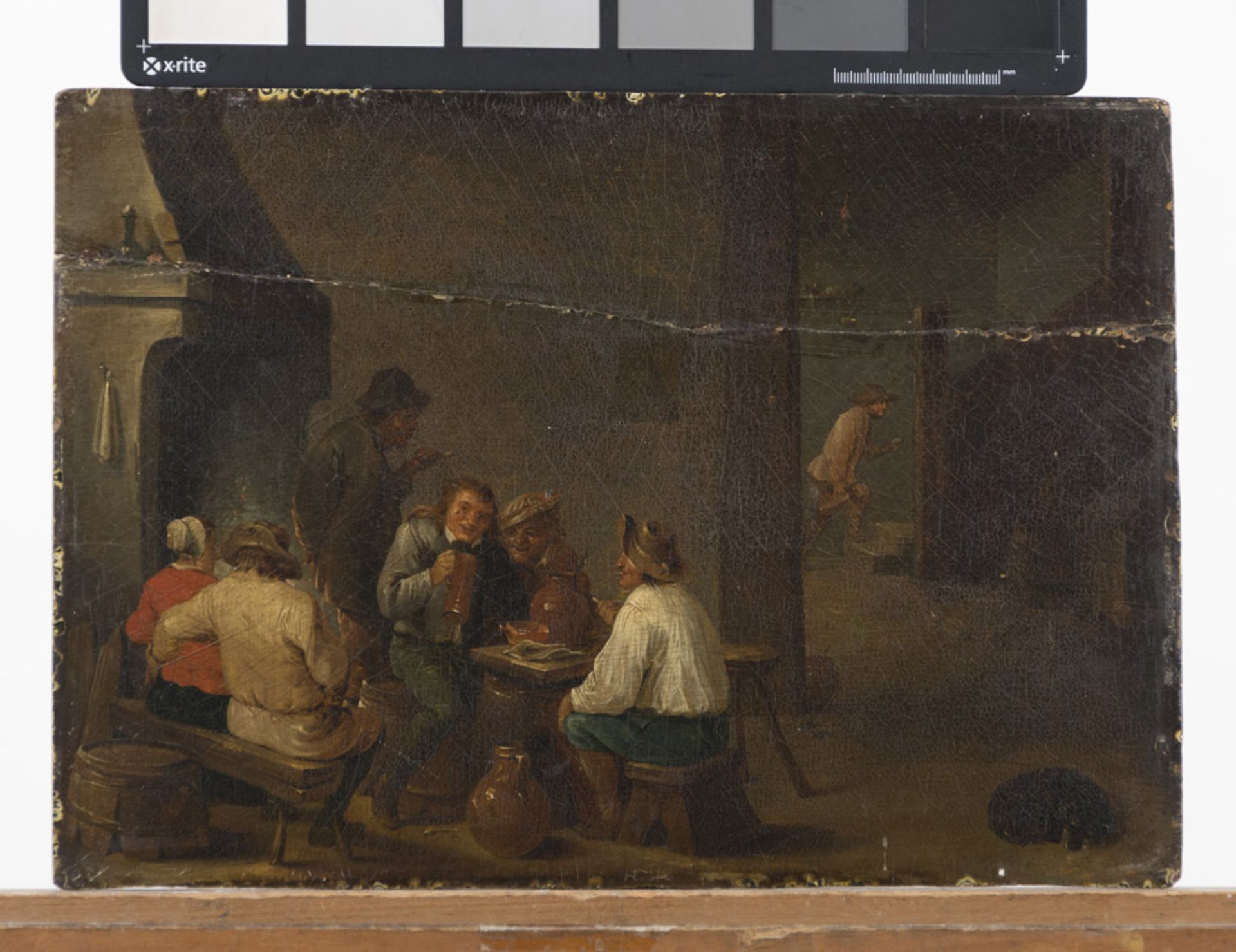 FLEMISH PAINTER, LATE 18TH CENTURY INSIDE OF INN WITH DRINKERS AND SMOKERS Oil on paper applied on