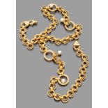 Necklace Of Custom jewelry, 1970s in gilded metal with strass and false pearls. Length cm. 88.