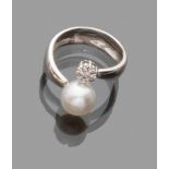 RING in white gold 18 kts. with pearl and diamonds. Pearl mm 10, diamonds ct. 0,25, total weight gr.