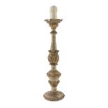 GILTWOOD CANDLESTICK, LATE 18TH CENTURY shaft sculpted to leaves. h. cm. 54. Falls of lacquer,