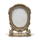BEAUTIFUL TABLE MIRROR, ROME SECOLO oval frame sculpted to pods and rolled up ribbon, with light