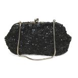 EVENING PURSE, 1950S in black fabric overall embroidered with beads and paillettes, short chain