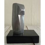 John Milne (1931-1978)Cylindrical aluminum form,height (excl. base)7.5".