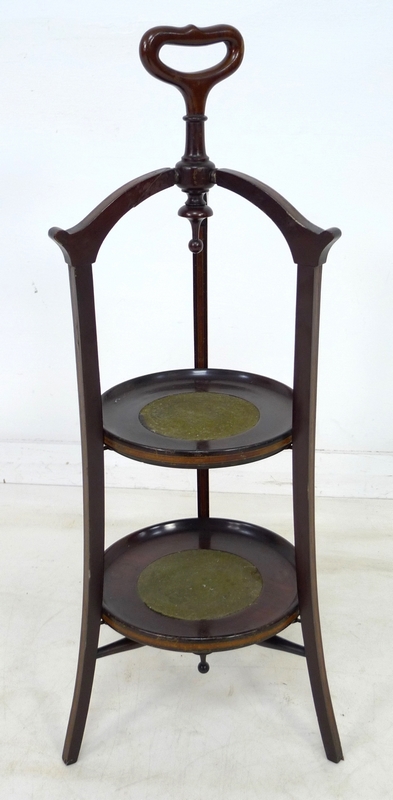 A Victorian mahogany two tier cake stand, with crossbanding and line inlay,