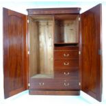 A Victorian flame mahogany wardrobe,