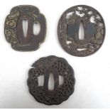 A group of three Japanese tsuba, 19th and early 20th century, the first of mokkogata shape,