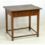 An 18th century oak plank top side table, with a single frieze drawer and drop brass pull handles,